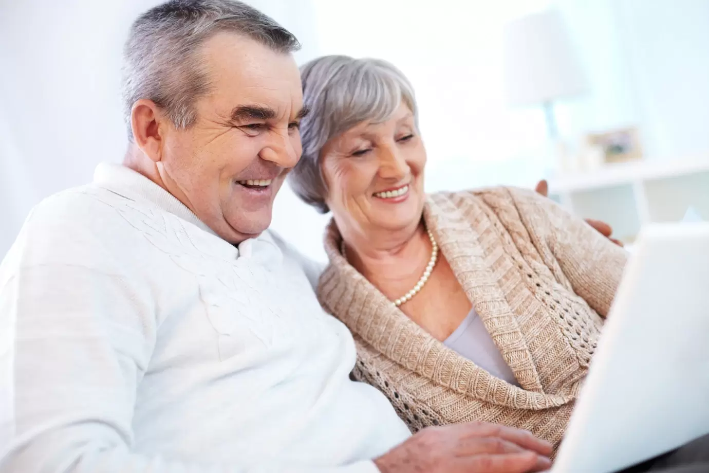 Grandparents using laptop 1098 1200